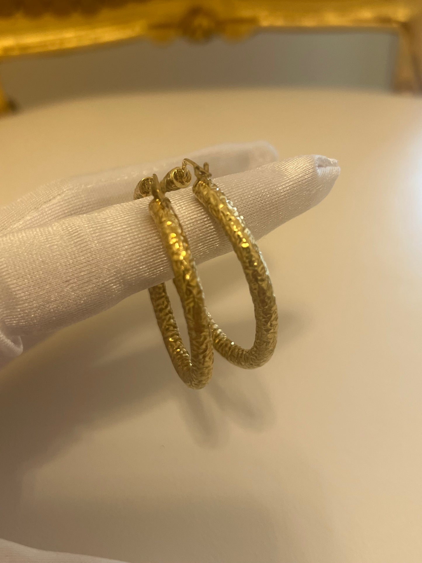 Orecchini a cerchio lavorati