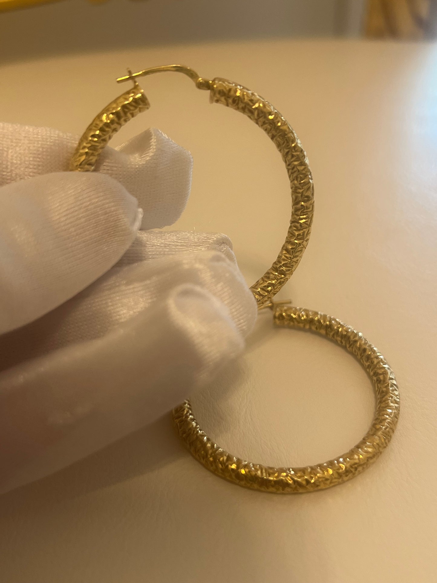 Orecchini a cerchio lavorati