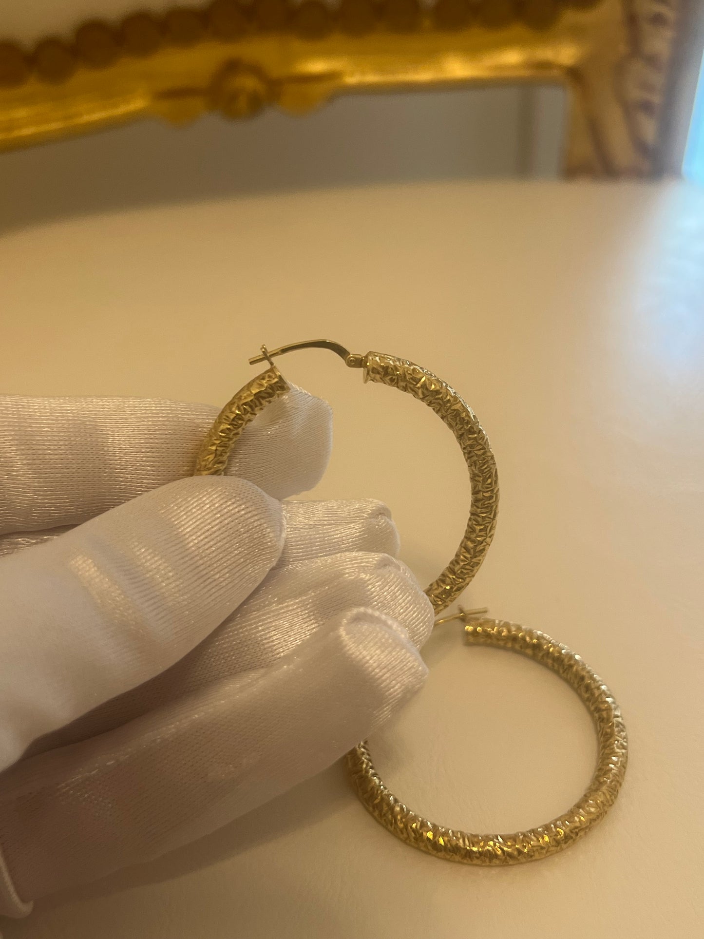 Orecchini a cerchio lavorati