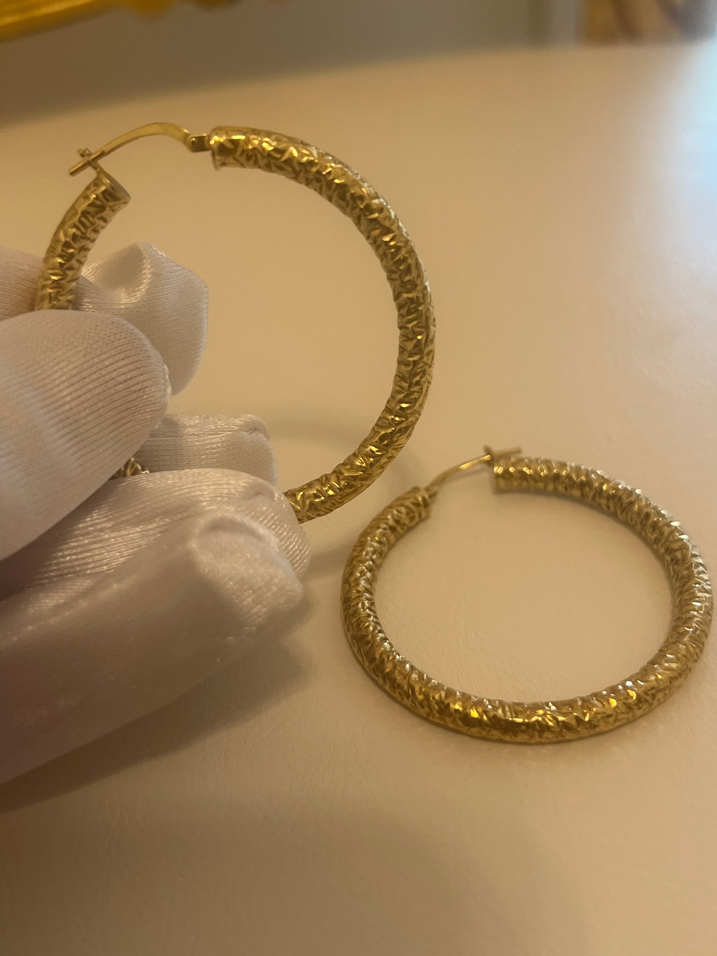 Orecchini a cerchio lavorati