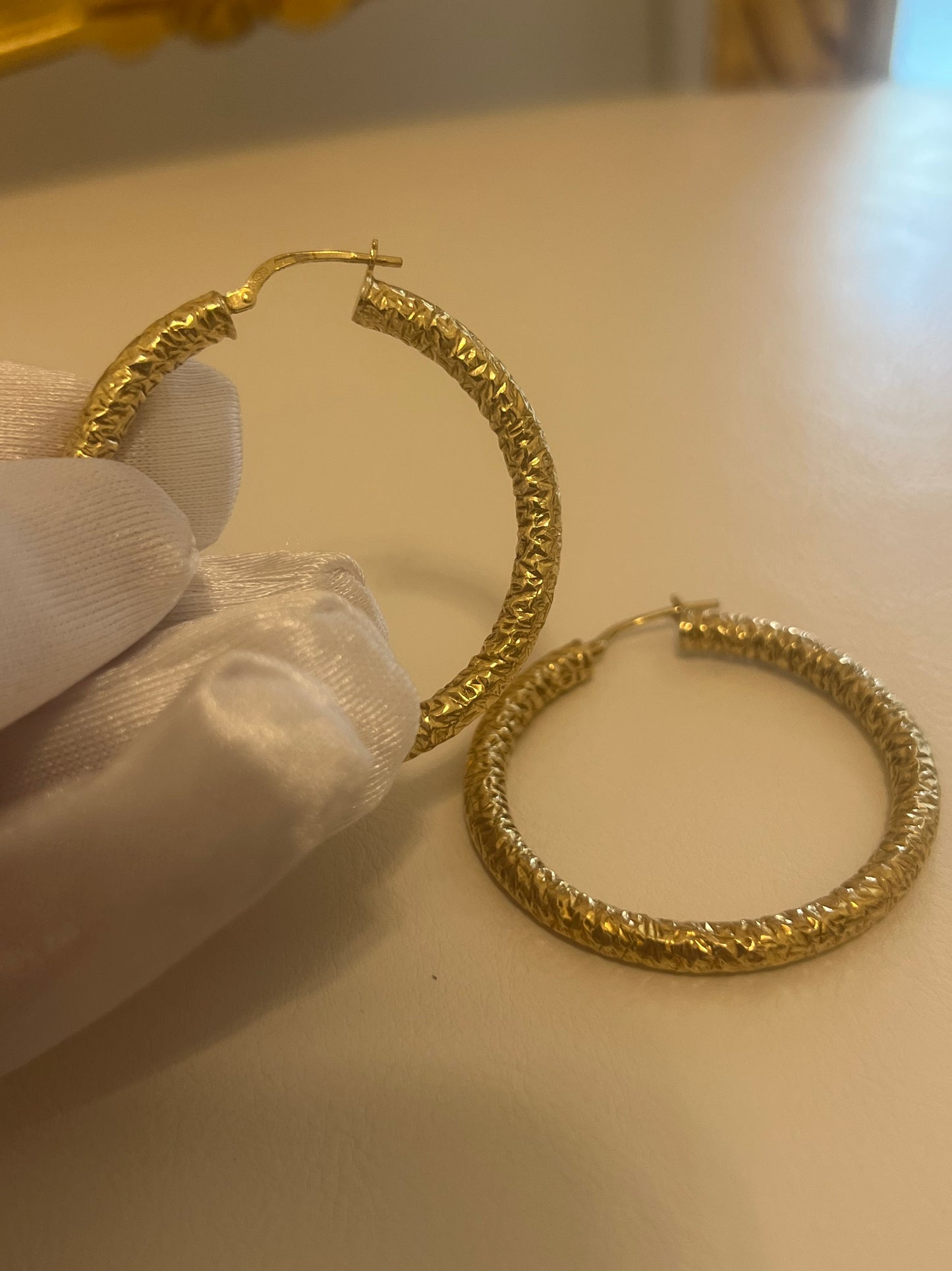 Orecchini a cerchio lavorati