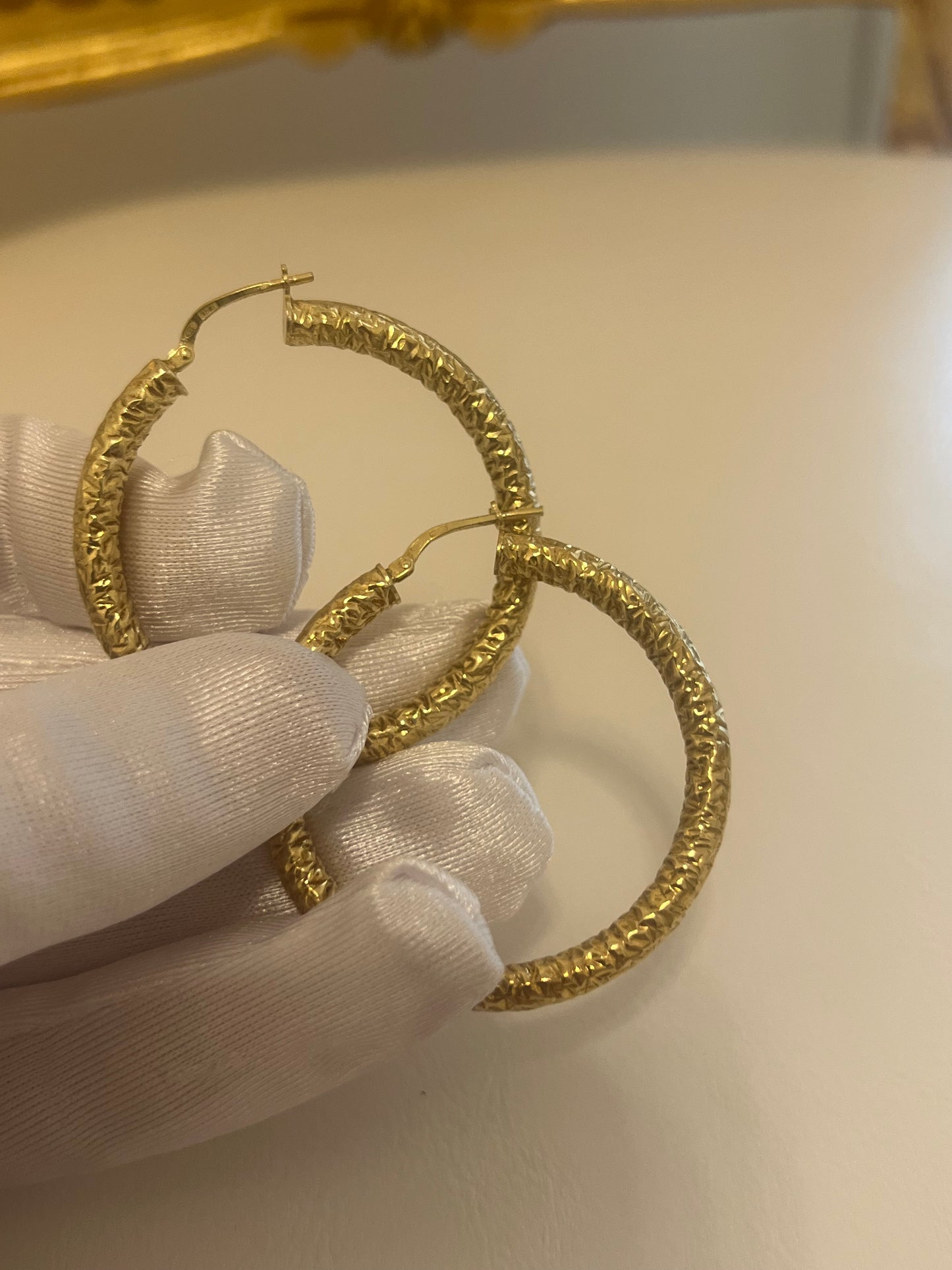 Orecchini a cerchio lavorati